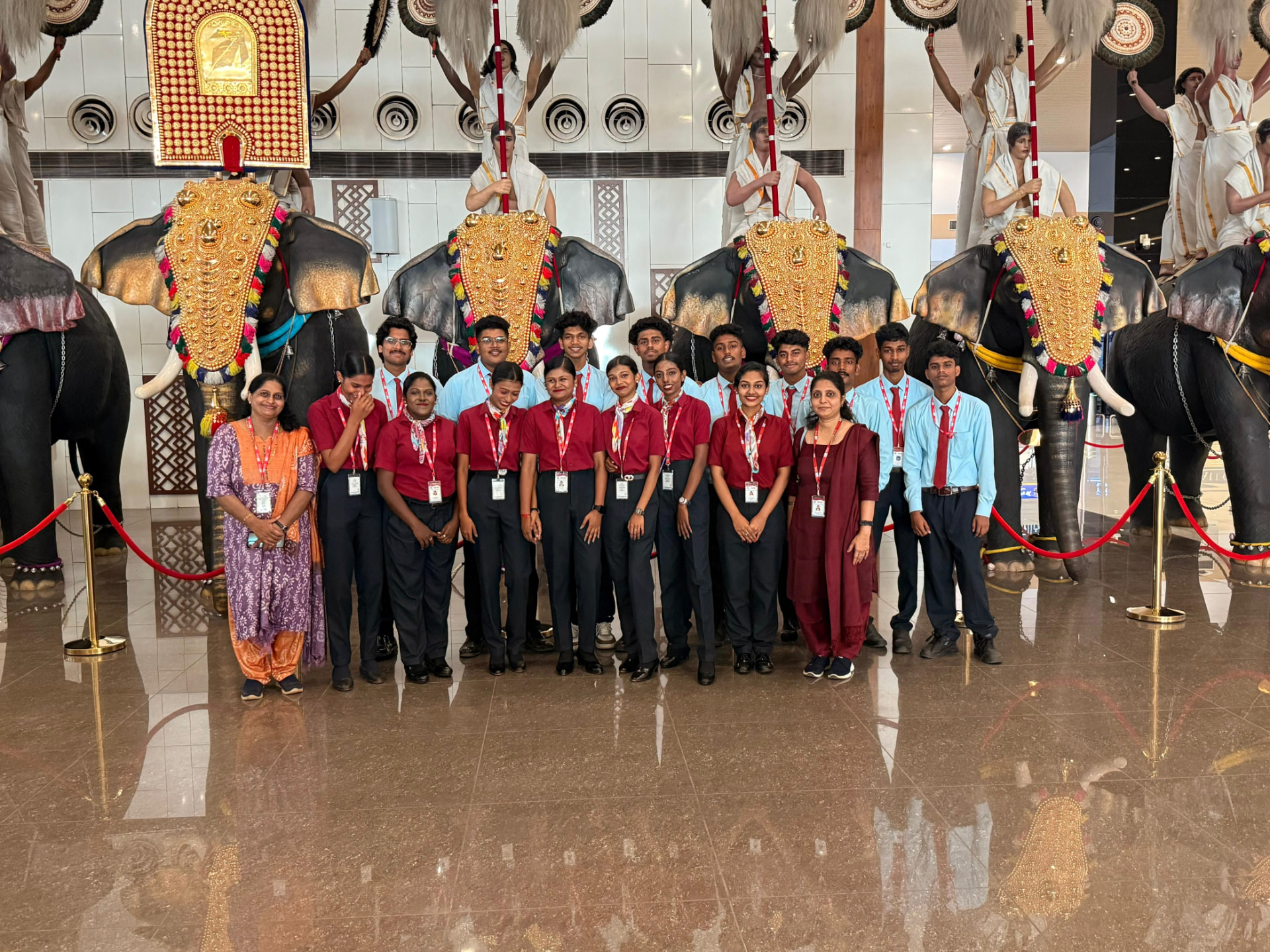Airline Institute batch of students in uniform with faculty during an airport visit at Trivandrum International Airport
